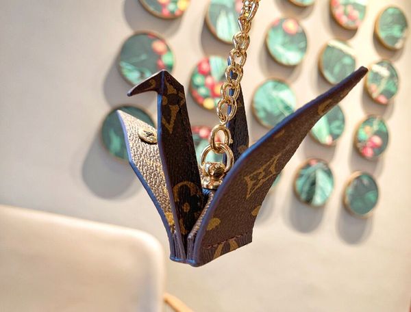 new paper crane keychains keyring leather stainless steel key chain famous designer luxury keychain accessories, Silver
new paper crane keychains keyring leather stainless steel key chain famous designer luxury keychain accessories, Silver