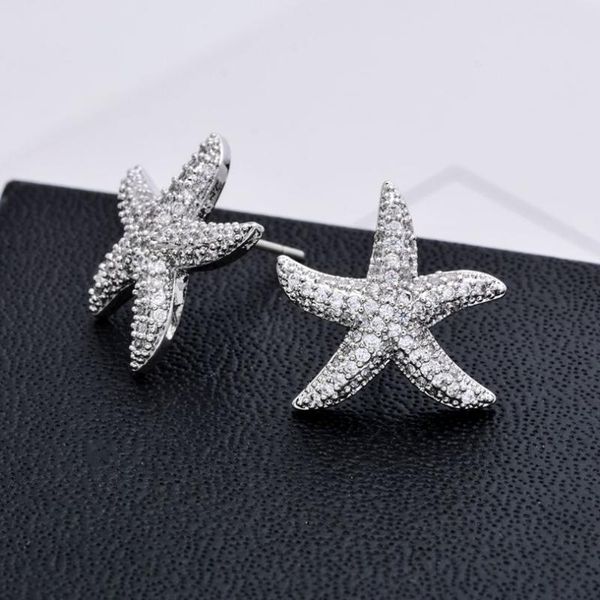 tsunami starfish earrings with silver color clear cz stud earring for woman fashion jewelry party brincos femin 1pair, Golden;silver
tsunami starfish earrings with silver color clear cz stud earring for woman fashion jewelry party brincos femin 1pair, Golden;silver