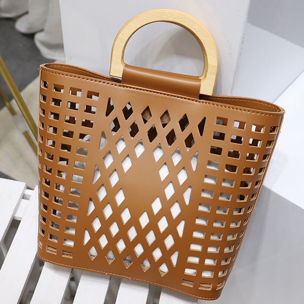 womens handbags fashion hollow out beach bag pu leather shoulder bag wood handle tote bags messenger casual tote hasp purses
womens handbags fashion hollow out beach bag pu leather shoulder bag wood handle tote bags messenger casual tote hasp purses