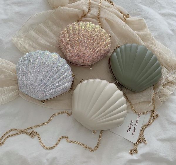 women summer bag small sequins shell shape bag ladies fashion plain sequine samll shoulder bag girls cute01
women summer bag small sequins shell shape bag ladies fashion plain sequine samll shoulder bag girls cute01