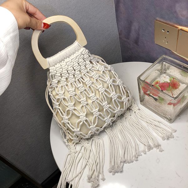 2020 summer handmade hollow woven bag tassel bag trend women handbag straw baodan shoulder ladies beach holiday bohemia
2020 summer handmade hollow woven bag tassel bag trend women handbag straw baodan shoulder ladies beach holiday bohemia
