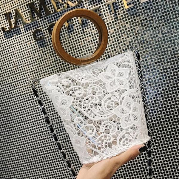 elegant female transparent tote bag 2020 summer new quality lace flowers women's designer handbag chain shoulder messenger bags
elegant female transparent tote bag 2020 summer new quality lace flowers women's designer handbag chain shoulder messenger bags