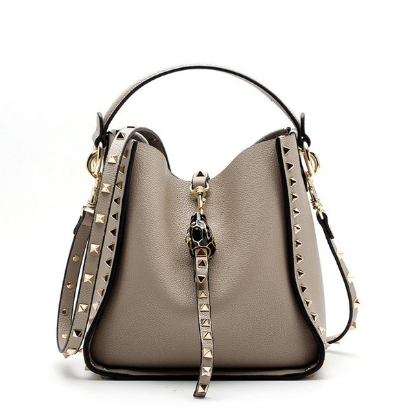 fashion style women's bucket bag genuine leather ladies rivet handbags female shoulder bag casual tote
fashion style women's bucket bag genuine leather ladies rivet handbags female shoulder bag casual tote