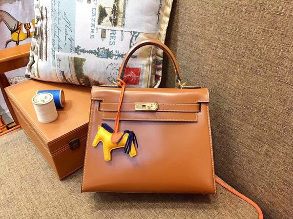 wholesale box leather keiily bag25cm,bown,grey color,handmade,wax thread,have gold,silver hardware, by order,fast delivery
wholesale box leather keiily bag25cm,bown,grey color,handmade,wax thread,have gold,silver hardware, by order,fast delivery