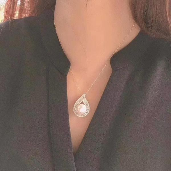 s925 sterling silver gold plated natural freshwater white pearl 10mm necklace waterdrops
s925 sterling silver gold plated natural freshwater white pearl 10mm necklace waterdrops