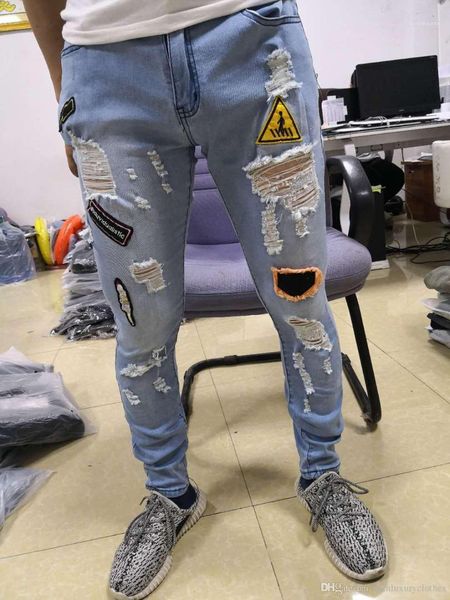embroidered designer denim blue pencil jean pants hiphop street trousers mens ripped slim fit jeans emblem
embroidered designer denim blue pencil jean pants hiphop street trousers mens ripped slim fit jeans emblem