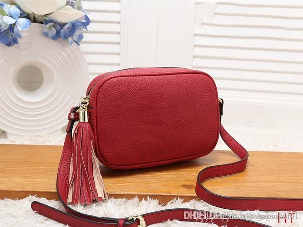 designer fashion women leather tassel bag disco shoulder bag purse handbags tote designer brand cross body bag women wallets handbag 
designer fashion women leather tassel bag disco shoulder bag purse handbags tote designer brand cross body bag women wallets handbag