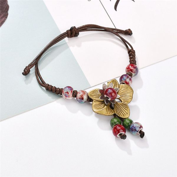 new handmade weave retro bohemia blue red ceramics bead alloy flowers pendant bracelet for women adjustable rope chain bracelets, Golden;silver
new handmade weave retro bohemia blue red ceramics bead alloy flowers pendant bracelet for women adjustable rope chain bracelets, Golden;silver