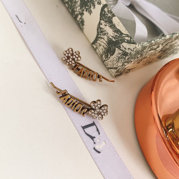 woven braceletd jia ja letter clover full diamond earrings 925 silver needle women's ear clip anti-allergy high version, White;black
woven braceletd jia ja letter clover full diamond earrings 925 silver needle women's ear clip anti-allergy high version, White;black