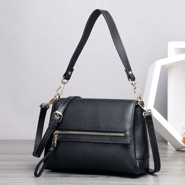 first layer cowhide leather three layer pocket design female bag portable slung leather bag ladies handbag female shoulder 
first layer cowhide leather three layer pocket design female bag portable slung leather bag ladies handbag female shoulder