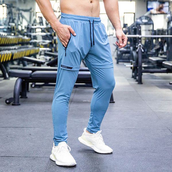 quick dry breathable elastic loose men running pants soccer basketball training trousers jogging fitness gym workout sport pants, Black;blue
quick dry breathable elastic loose men running pants soccer basketball training trousers jogging fitness gym workout sport pants, Black;blue