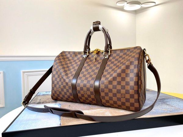 classic men duffle bag women travel bags hand luggage fashion mens pu leather handbags large cross body totes two size 45cm 55cm
classic men duffle bag women travel bags hand luggage fashion mens pu leather handbags large cross body totes two size 45cm 55cm