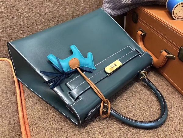 by order wholesale blue keily purse25cm,box leather,handmade wax thread,gold and silver hardware for chosen,fast delivery
by order wholesale blue keily purse25cm,box leather,handmade wax thread,gold and silver hardware for chosen,fast delivery