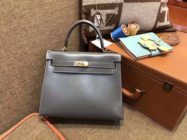 by order wholesale grey keily purse25cm,box leather,handmade wax thread,gold and silver hardware for chosen,fast delivery
by order wholesale grey keily purse25cm,box leather,handmade wax thread,gold and silver hardware for chosen,fast delivery