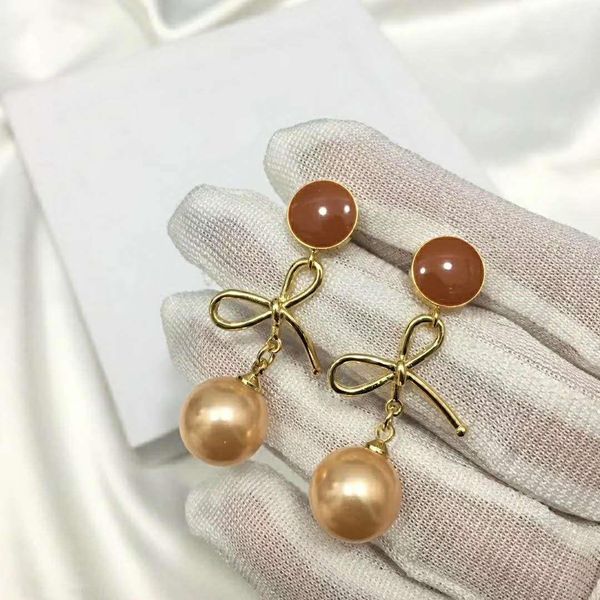 Hot Selling Explosive Bowknot Pearl Pendant Fashion Designer Earrings luxury designer jewelry women earrings
Hot Selling Explosive Bowknot Pearl Pendant Fashion Designer Earrings luxury designer jewelry women earrings