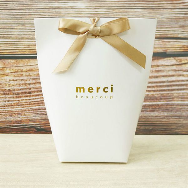 100pcs kraft paper white merci thank you cake boxes and packaging wedding candy dragees gift box chocolate wrapping supplies
100pcs kraft paper white merci thank you cake boxes and packaging wedding candy dragees gift box chocolate wrapping supplies