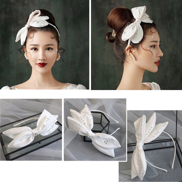 the latest and most fashionable bridal wedding headdress satin bow headband pearl rhinestone handmade craftsmanship party shiny hairpin jewe, Silver
the latest and most fashionable bridal wedding headdress satin bow headband pearl rhinestone handmade craftsmanship party shiny hairpin jewe, Silver