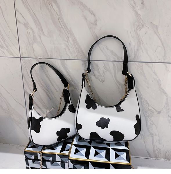 2020 small crowd style milk-print saddle chain vintage moon bag small personality mini one-shoulder armpit bag
2020 small crowd style milk-print saddle chain vintage moon bag small personality mini one-shoulder armpit bag