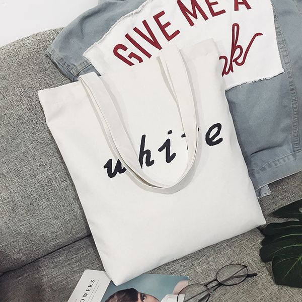 women cute simple solid color style canvas shopping handbag lady shoulder bag wild letter print large capacity storage bags
women cute simple solid color style canvas shopping handbag lady shoulder bag wild letter print large capacity storage bags