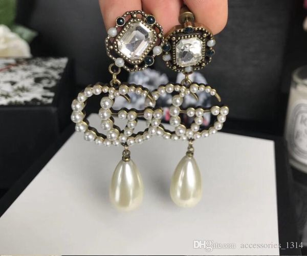 fashion retro creative old pearl letter g earrings female bead with old brass bottom retro personality pearl earrings, Golden;silver
fashion retro creative old pearl letter g earrings female bead with old brass bottom retro personality pearl earrings, Golden;silver