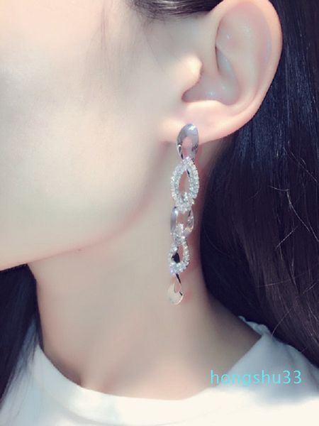 new ins fashion luxury designer sparkling diamond rhinestone twisted geometric long chandelier dangle stud earring for women girls, Silver
new ins fashion luxury designer sparkling diamond rhinestone twisted geometric long chandelier dangle stud earring for women girls, Silver