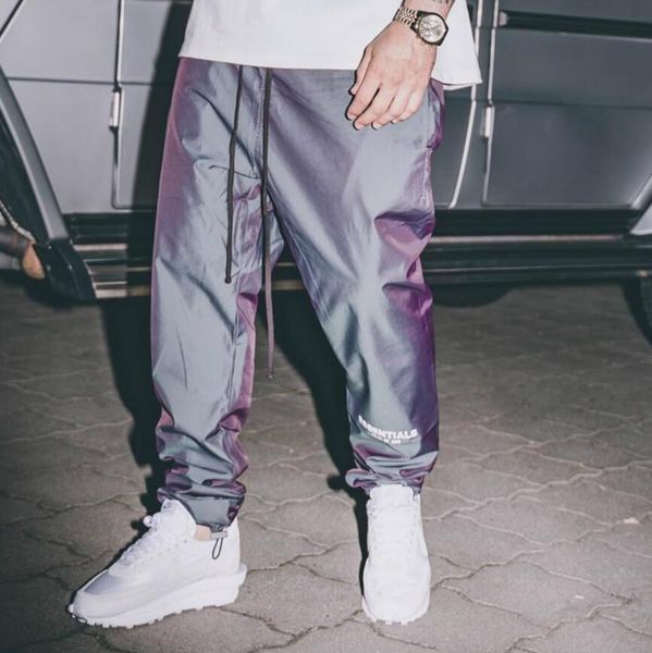 reflective thin nylon track pants lightweight loose jogger elastic cuffs three-pocket styling, Black
reflective thin nylon track pants lightweight loose jogger elastic cuffs three-pocket styling, Black