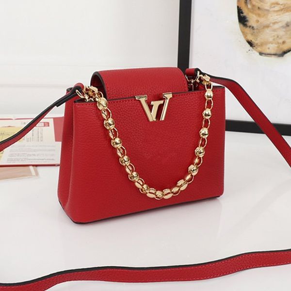 female designer mini handbag whole grain leather lady classic messenger one-shoulder bag
female designer mini handbag whole grain leather lady classic messenger one-shoulder bag