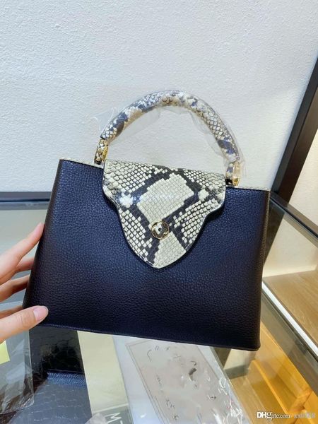 2020 новая кожа личи сумка рот змеиной шаблон классический универсальный сумочку женщин с диагональным висит сумка
2020 новая кожа личи сумка рот змеиной шаблон классический универсальный сумочку женщин с диагональным висит сумка