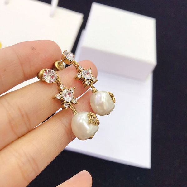 

Factory outlet D home among the stars flash irregular pearl earrings set auger female S925 silver needle anti allergic to bees earrings