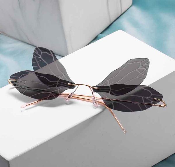 2020 womens new fashion special designer shades sunglasses street retro sunglass lady rimless dragonfly uv 400 sunglass eyewear, White;black
2020 womens new fashion special designer shades sunglasses street retro sunglass lady rimless dragonfly uv 400 sunglass eyewear, White;black