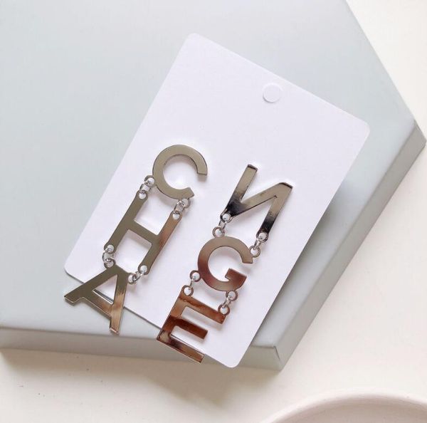 2019 europe and america asymmetrical glossy letter earrings 925 silver needle round face was thin long temperament earrings female, Golden;silver
2019 europe and america asymmetrical glossy letter earrings 925 silver needle round face was thin long temperament earrings female, Golden;silver