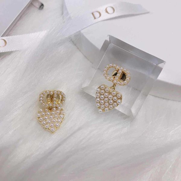 dijia/d new love pearl cd letter earrings fashionable simple earrings, White
dijia/d new love pearl cd letter earrings fashionable simple earrings, White