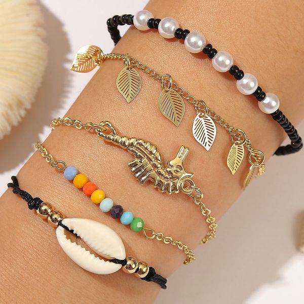 5pcs/set boho black bead white pearl beaded handmade charm bracelets for women bohemian natural shell gold leaf chain bracelet, Golden;silver
5pcs/set boho black bead white pearl beaded handmade charm bracelets for women bohemian natural shell gold leaf chain bracelet, Golden;silver