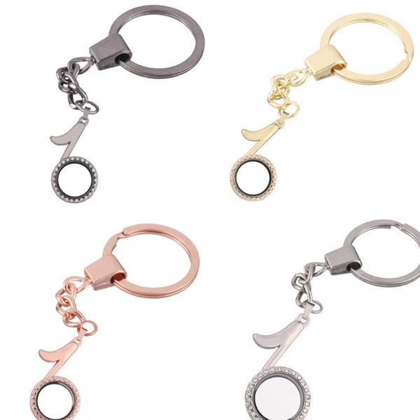 1pcs musical note zinc alloy rhinestone floating charms locket keychain diy magnetic twist living memory glass locket key ring, Silver
1pcs musical note zinc alloy rhinestone floating charms locket keychain diy magnetic twist living memory glass locket key ring, Silver