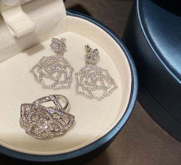 women three-dimensional flower elegant lady hollow camellia earrings zircon ring jewelry set, Silver
women three-dimensional flower elegant lady hollow camellia earrings zircon ring jewelry set, Silver