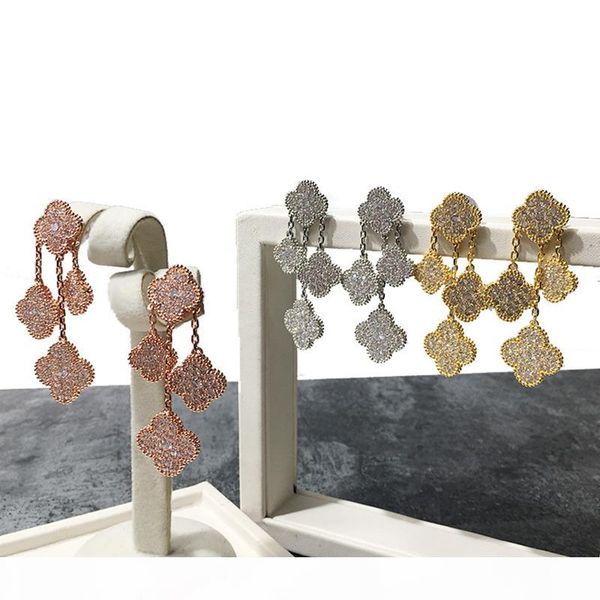 four flowers full diamond earrings shell tiger eye earrings 2019 wholesale women's earrings clover white fritillary fashion simple, Golden;silver
four flowers full diamond earrings shell tiger eye earrings 2019 wholesale women's earrings clover white fritillary fashion simple, Golden;silver
