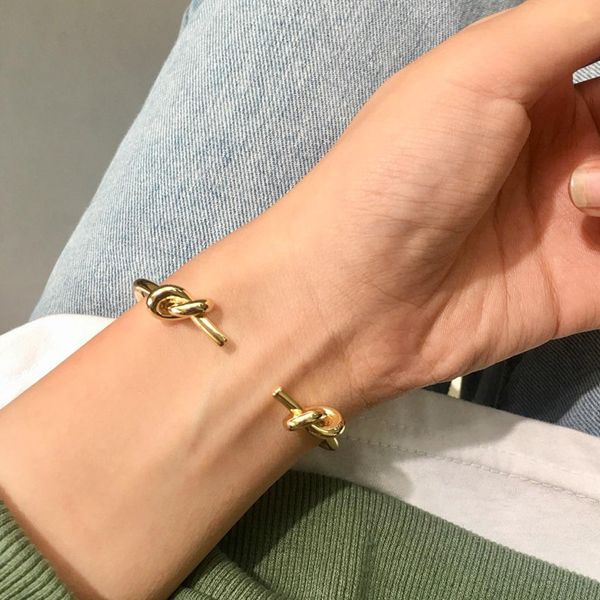 fashion brand new open design rope knot design yellow gold color cross bangle for women wedding jewelry, Black
fashion brand new open design rope knot design yellow gold color cross bangle for women wedding jewelry, Black