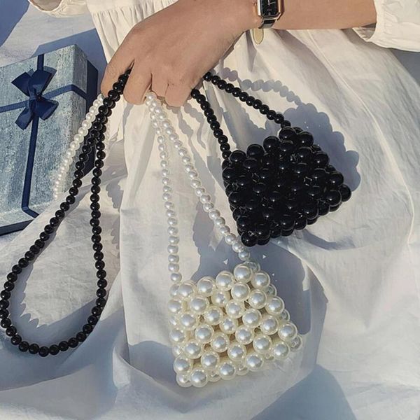 mini square crossbody bag 2020 summer new high-quality women's designer handbag pearl shoulder messenger bag travel
mini square crossbody bag 2020 summer new high-quality women's designer handbag pearl shoulder messenger bag travel
