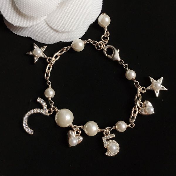 selling woman bracelet pearl heart bracelet for gift charm brass bracelet fashion jewelry supply, Golden;silver
selling woman bracelet pearl heart bracelet for gift charm brass bracelet fashion jewelry supply, Golden;silver