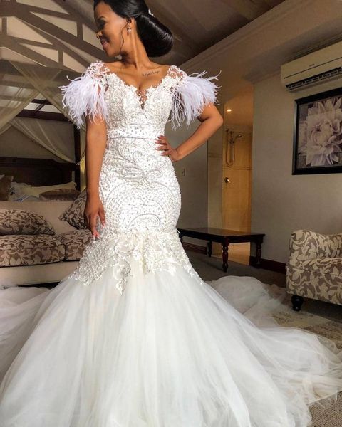 2020 luxury mermaid wedding dresses beaded lace bridal gowns with feather sleeveless sweep train custom made robe de mariee, White
2020 luxury mermaid wedding dresses beaded lace bridal gowns with feather sleeveless sweep train custom made robe de mariee, White