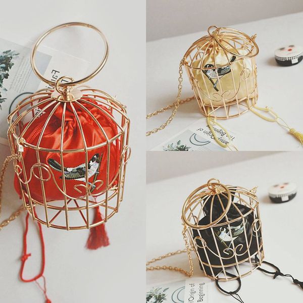 personality bird cage women handbag tote metal cage girls handle bags coin purse fashion party pouch tassel clutch
personality bird cage women handbag tote metal cage girls handle bags coin purse fashion party pouch tassel clutch