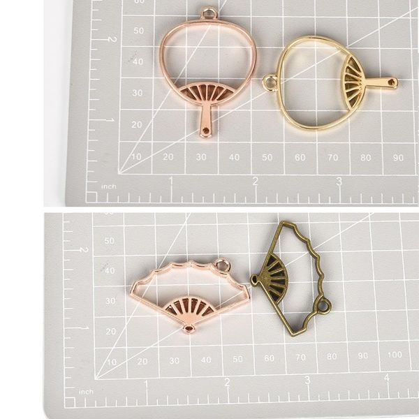 5pcs alloy fans charm glue blank open bezels tray hollow pendant setting uv resin metal frame for diy jewelry making handmade
5pcs alloy fans charm glue blank open bezels tray hollow pendant setting uv resin metal frame for diy jewelry making handmade