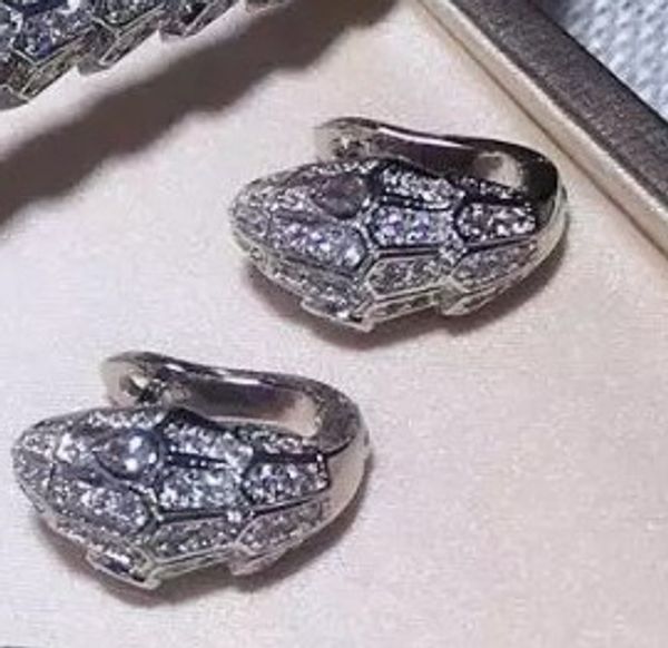 zircon stone white eyes earrings women luxury party jewelry, Golden;silver
zircon stone white eyes earrings women luxury party jewelry, Golden;silver