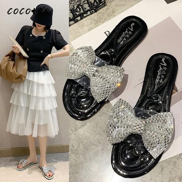 2020 new korean version of the summer paragraph wild bowknot soft bottom word drag fashion sandals and slippers female wear, Black
2020 new korean version of the summer paragraph wild bowknot soft bottom word drag fashion sandals and slippers female wear, Black