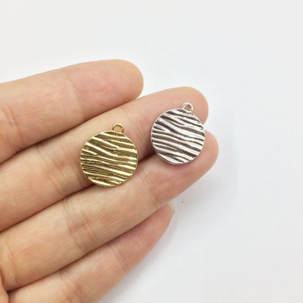 eruifa 20pcs 15mm water ripple gold/silver plated zinc alloy charms pendant jewelry diy necklace 2 colors, Bronze;silver
eruifa 20pcs 15mm water ripple gold/silver plated zinc alloy charms pendant jewelry diy necklace 2 colors, Bronze;silver