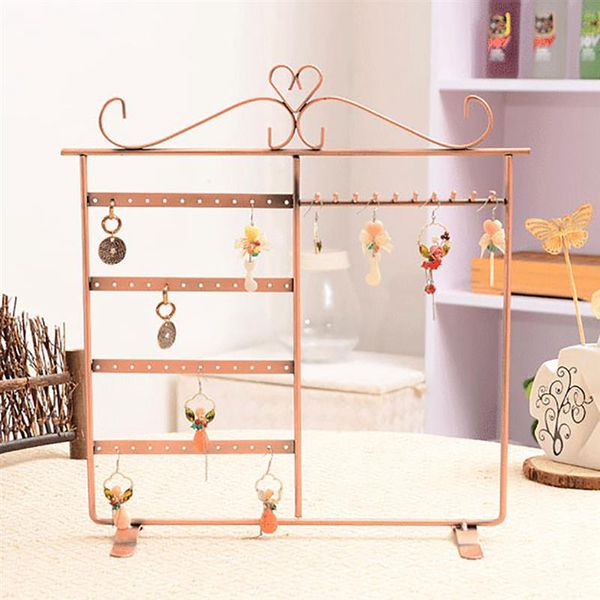 earring holder metal jewelry display hanger 48-hole 10-hook earring holder necklace display jewelry, Pink;blue
earring holder metal jewelry display hanger 48-hole 10-hook earring holder necklace display jewelry, Pink;blue