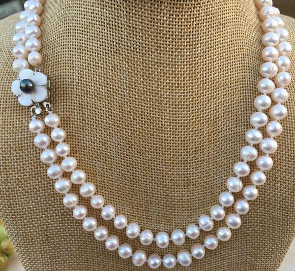 2row 7-8mm natural white freshwater pearl necklace 17-18 inch shell flower clasp, Silver
2row 7-8mm natural white freshwater pearl necklace 17-18 inch shell flower clasp, Silver