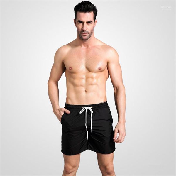 fitness training sports mens shorts solid color loose active teenager apparel summer quick drying reflective beach pants, White;black
fitness training sports mens shorts solid color loose active teenager apparel summer quick drying reflective beach pants, White;black