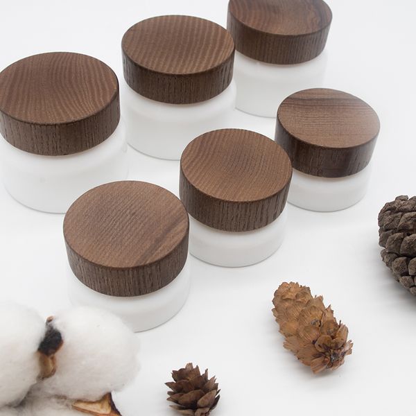 15g 50g frosted white travel glass jar skin care eye cream jars pot refillable bottle cosmetic container with wood grain lid
15g 50g frosted white travel glass jar skin care eye cream jars pot refillable bottle cosmetic container with wood grain lid