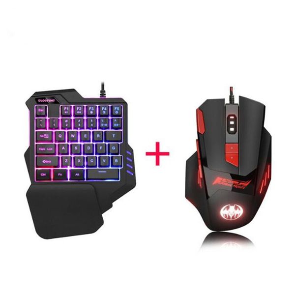 одной рука игровой клавиатуры mini usb проводной 35keys 6400d мышь комбо один горб для mobile smartphone 7цветов светодиодной подсветки
одной рука игровой клавиатуры mini usb проводной 35keys 6400d мышь комбо один горб для mobile smartphone 7цветов светодиодной подсветки